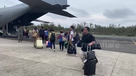 Hundreds of tourists stranded by Typhoon Krathon taken home on C-130 plane