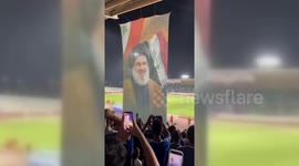 Iraq: Spectators at Al-Fayhaa Stadium in Basra, Iraq, held up a large image of Hassan Nasrallah