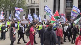 'F*** you! F*** you!' Emotions run high as Palestine supporters march past pro-Israel counter-protest in central London