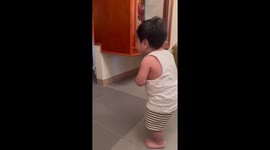 Toddler imitates grandma's walk in funny video