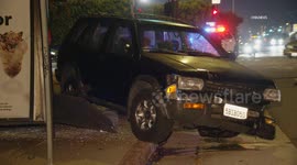 US, Los Angeles: Van Nuys SUV Hits Vehicle And Crashes Into Bus Stop