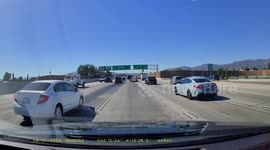 Narrowly Avoiding a Jackknifing Trailer on the Freeway