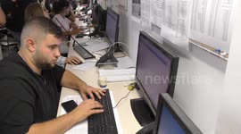 The 106 (=911) municipal call center at the emergency command center in an underground fortified shelter, monitoring city events, responding to crisis, bomb shelters.