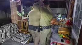 Police catch python in family's home in Thailand