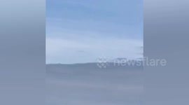 Communist fighter jet crashes killing pilot and passenger in Laos