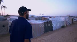 Gaza Strip: Gaza musician teaches displaced children music to dispel fear of war