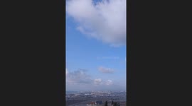 Israel's Iron Dome intercepts dozens of missiles fired from Lebanon, vertical clip