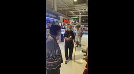 Grandfather, 90, gives ice cream treat to wife