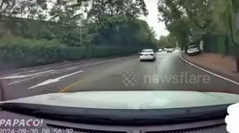 Narrow escape for drivers as falling piledriver blocks busy road