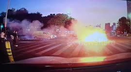 Terrifying moment electric scooter bursts into flames on busy road in China - rider rolls to safety as flames engulf vehicle