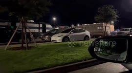US: Residents Evacuate To High Ground Parking Lot In Florida Ahead Of Hurricane Milton