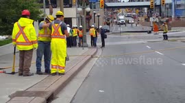 Massive sinkhole opens on road in Canada