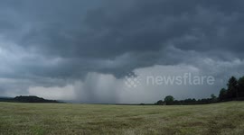 Beautiful thunderstorm passes across fields in Northern Ireland