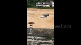 Severe flooding sweeps vehicles away