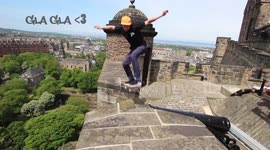 Man rides skateboard on top of Edinburgh Castle