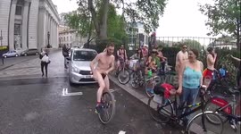 Nude cyclists attend the annual world naked bike ride day in London