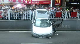 SUV crashes through guardrail injuring four