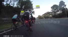 Cyclist rolls over friend's head