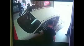 Car falls into inspection pit in service station