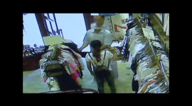 Couple cooperate to steal clothes