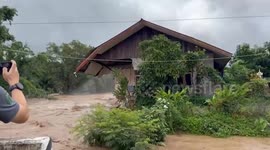 House collapses into river amid floods in northern Thailand
