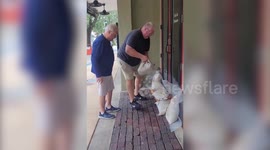 Businesses boarding up their windows and putting sandbags outside as Hurricane Milton approaches Florida