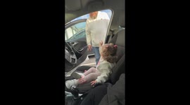Funny one year old wants to drive the car and won’t let dad get in