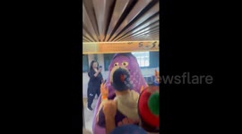 US: McDonald’s Grimace Surprises Mets Fans On NYC Subway Ahead Of NLDS Game