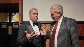 Former Crimewatch presenter Nick Ross is amazed by Magician Michael J Fitch nut and bolt trick at The Magic Circles A Grand Night Of Magic Event