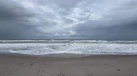 Cyclone Milton Sends Warning Signs: Rough Surf and Dark Clouds Over Canova Beach