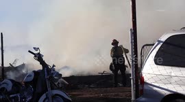 US, Los Angeles: El Mirage Fire Damages Residence and Destroys Multiple Vehicles and Outhouses