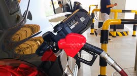 China: A Vehicle Fills Up at A Gas Station in Beijing