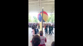 Teachers play game with giant volleyball