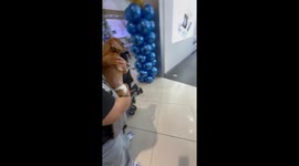 Pet dog perplexed by encounter with surprisingly life-like robot dog