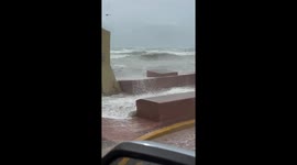 Storm surge and waves at Southernmost point in Key West Florida from hurricane Milton