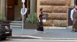 Sarah Ellen leaves her hotel in Sydney, Australia