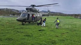 Philippine Air Force helicopter brings aid to typhoon victims