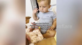 Sweet moment deaf tot meets baby sister for the first time and mouths