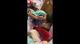 Pet pooch has adorable reactions playing with schoolboy