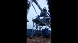 Crew Transfer Vessel attaching to wind turbine with Ampleman bridge