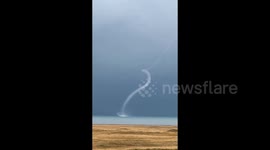 Stunning waterspout resembling twisting dragon amazes locals in central China