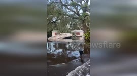 US: Hillsborough Deputies Navigating Flooded Streets by Boat After Hurricane Milton