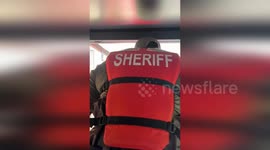 US: 91-Year-Old Rescued Amidst Rising Floodwaters in Lithia