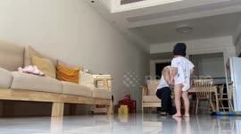 Talented toddler learns breakdancing with dad at home