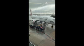 Hopefully the baggage is waterproof! Wild weather in Melbourne abandons flight and luggage left on tarmac
