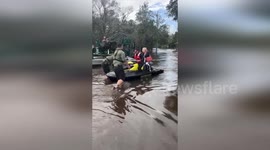 Pensioner carried to safety on jet ski through Hurricane Milton floods