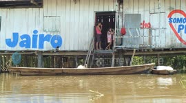 Intense flooding in the Amazon Rainforest communities. Locals face challenges each year to adapt to the fluctuating water levels from massive rainfall.