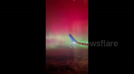 Canada: Aurora Seen From Airplane Window