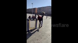 Elderly woman demonstrates incredible flexibility on public gym equipment in China