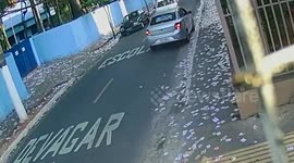 Brazil: Elderly Woman Slips On Street Covered In Election Campaign Flyers